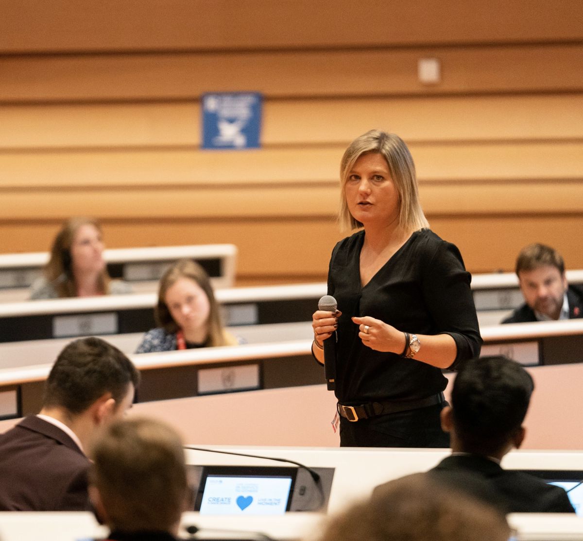Jen addressing an audience at the United Nations